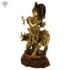 Photo of Standing Lord Krishna Statue with Flute and Cow-16"-Facing Right side