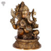 Photo of Brown Coloured Lord Ganesh Ji Statue - facing Left Side